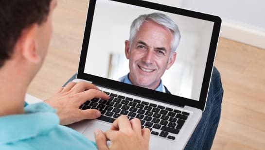 Patient and doctor having communicating by video link